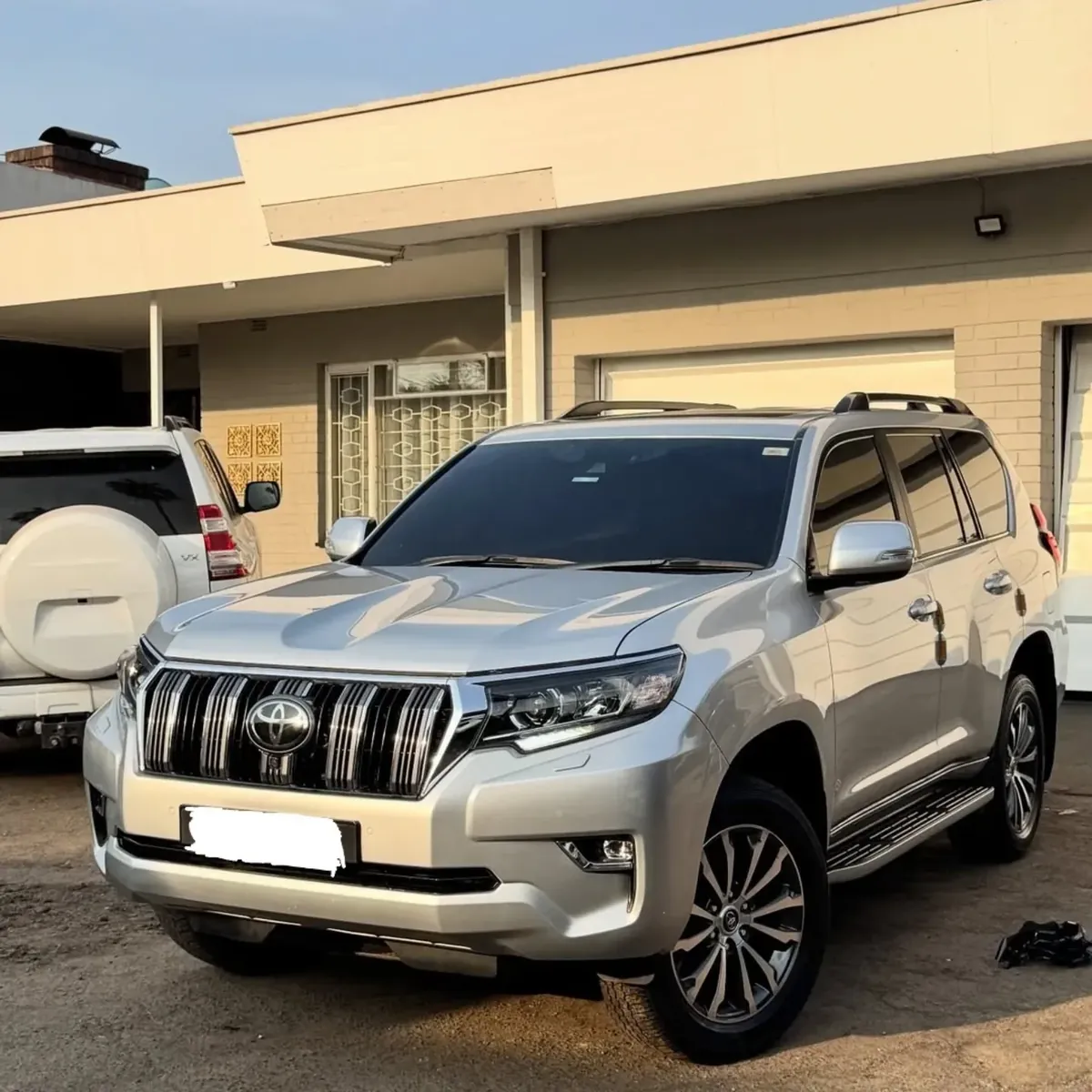 Toyota Land Cruiser Prado, front three-quarter view with tinted glass